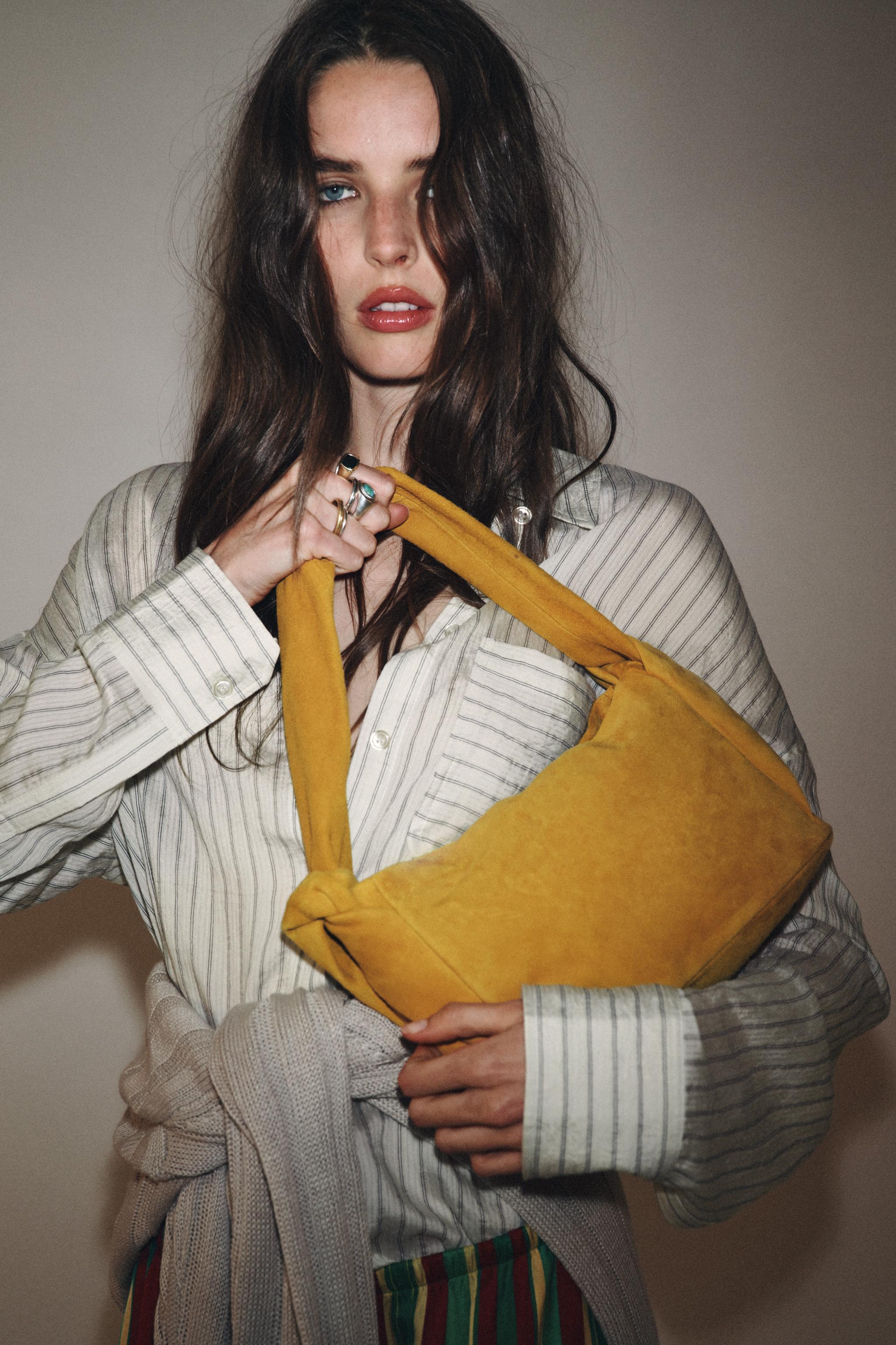 SPLIT LEATHER HANDBAG