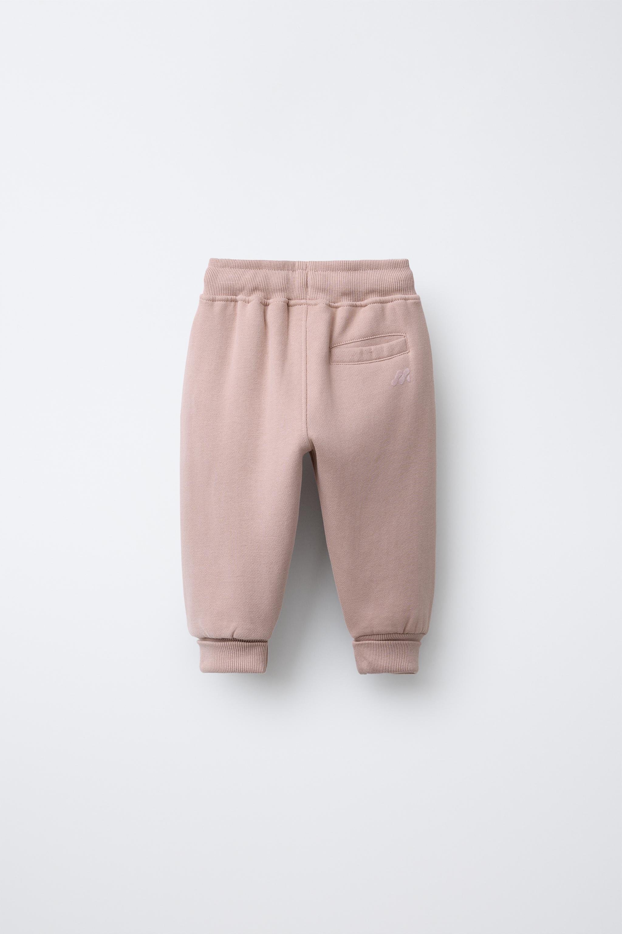 FLOCKED LOGO JOGGER PANTS