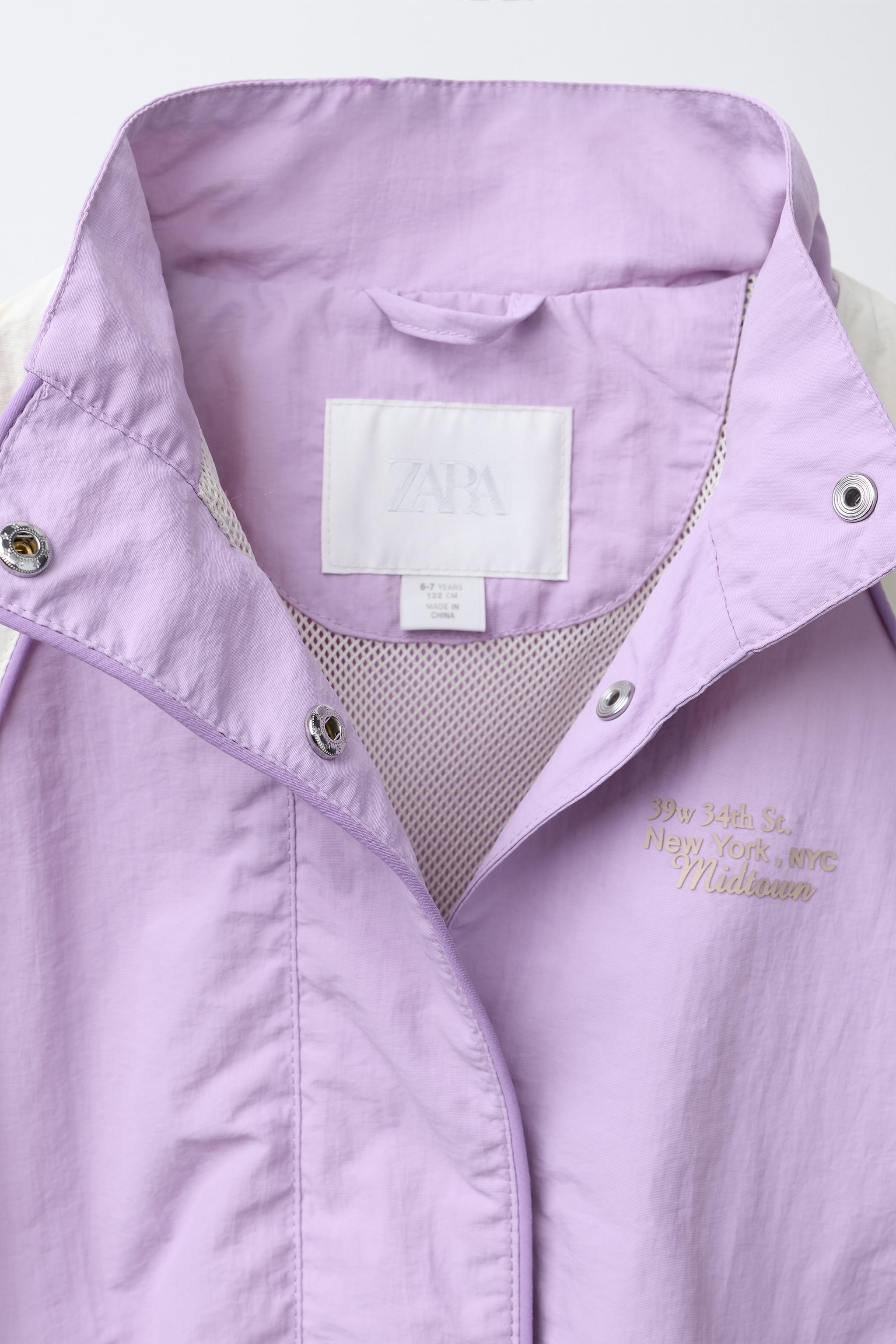 CONTRAST TRIM DETAIL RAINCOAT