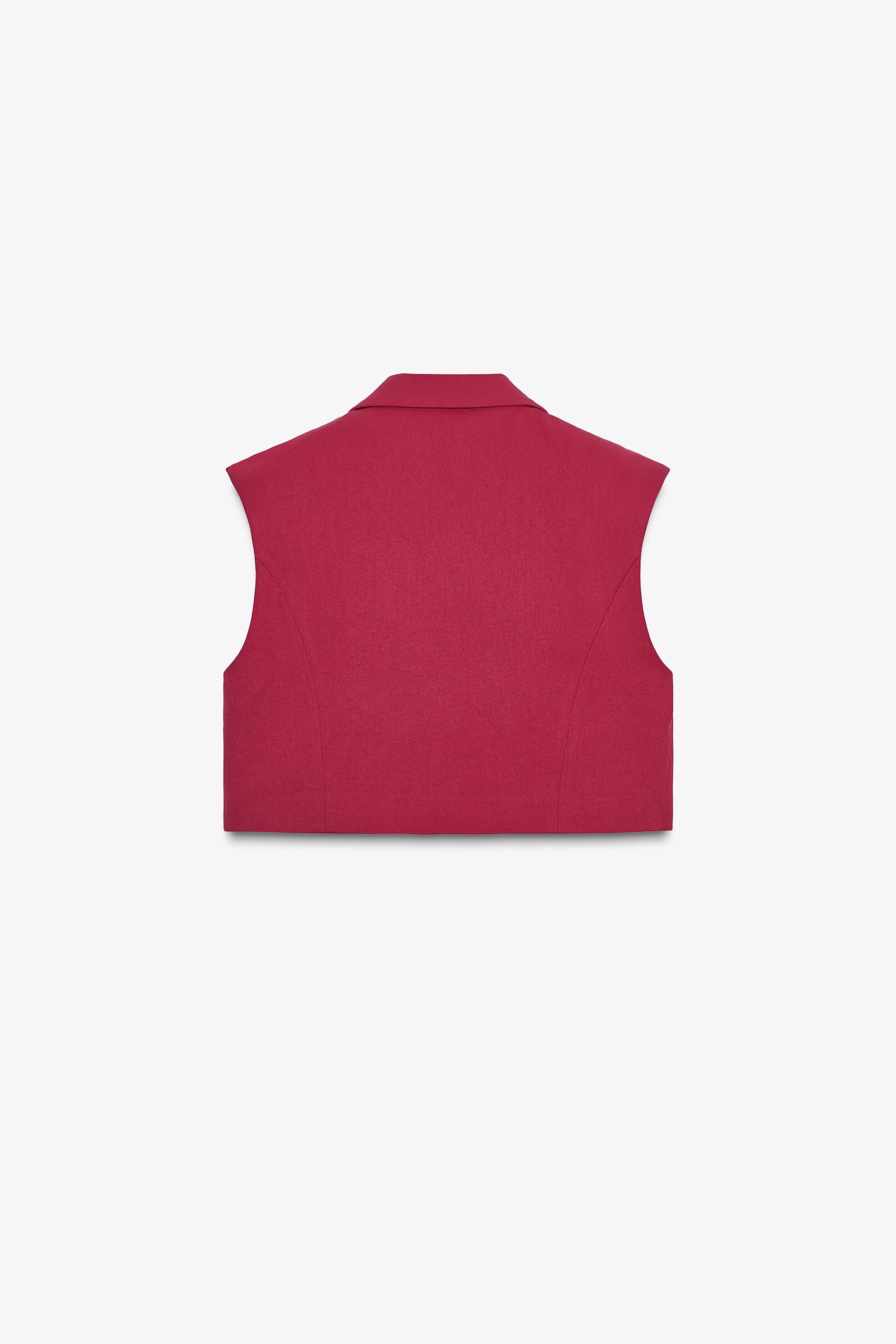 SHORT VEST WITH FLAPS