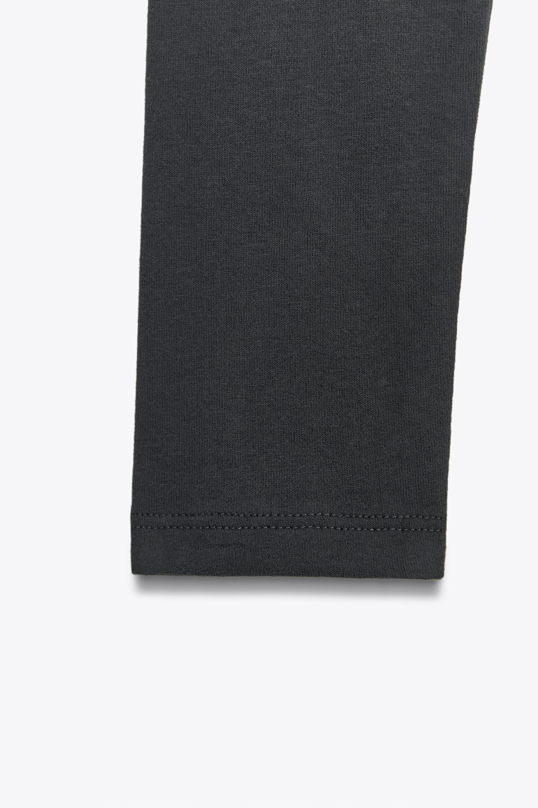 ASYMMETRIC LONG SLEEVE BODYSUIT