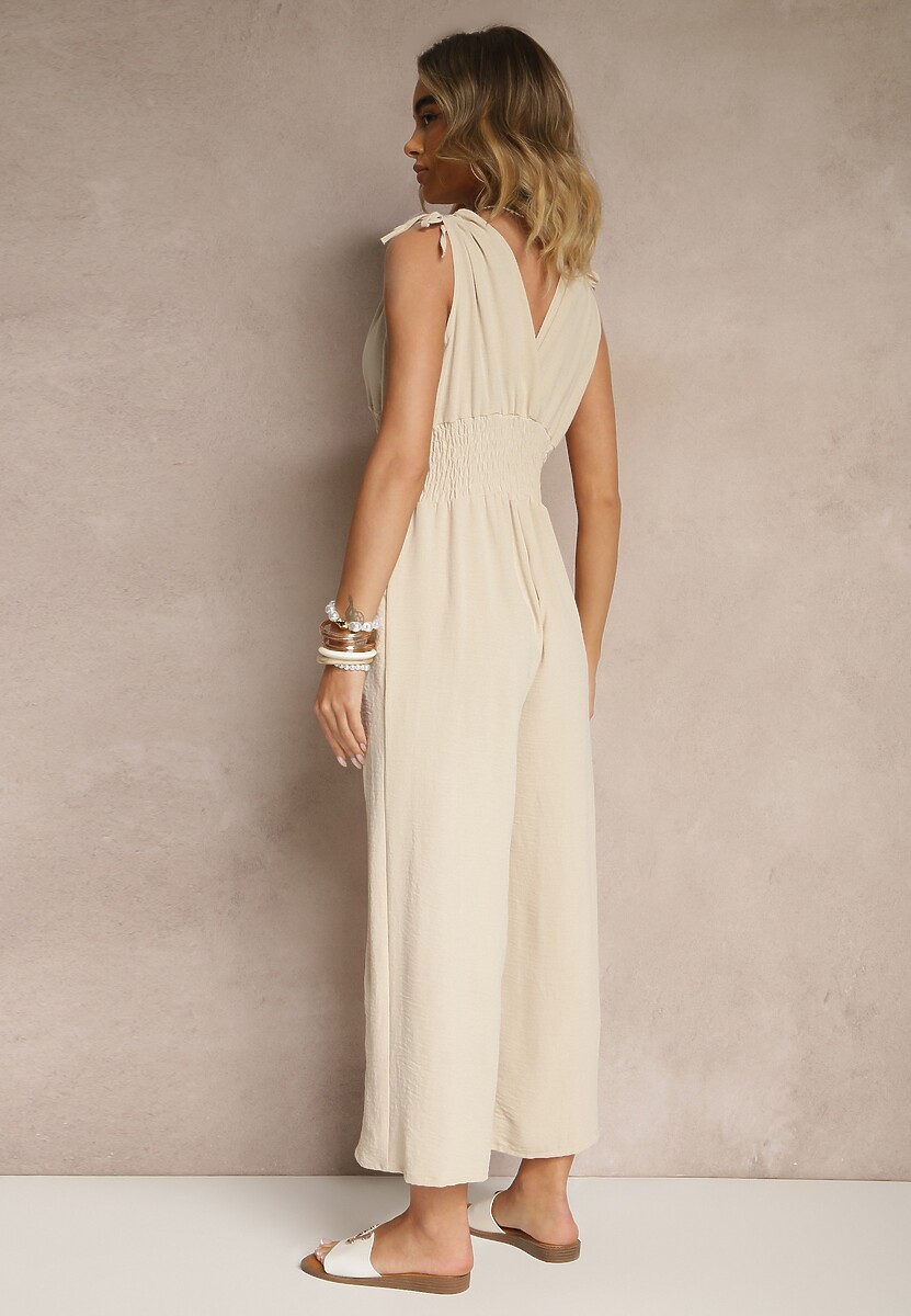 Beżowy Taliowany Kombinezon z Bawełną i Kopertowym Dekoltem Lunimas