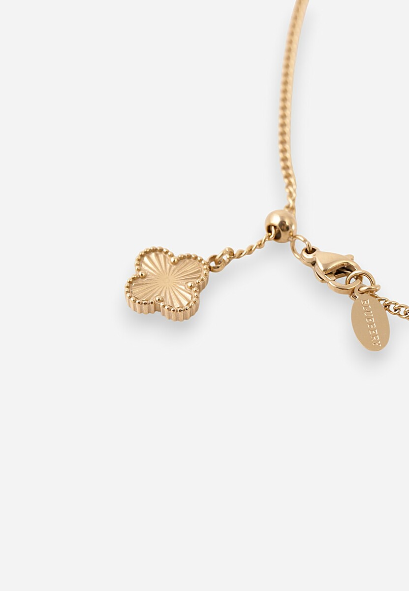 Złota Bransoletka Ozdobiona Koniczynką Irriella