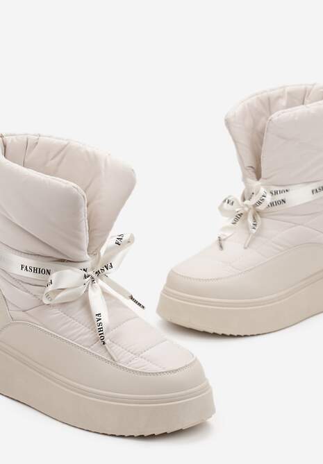 Beżowe Śniegowce z Ozdobną Wstążką Wokół Kostki Rohessi