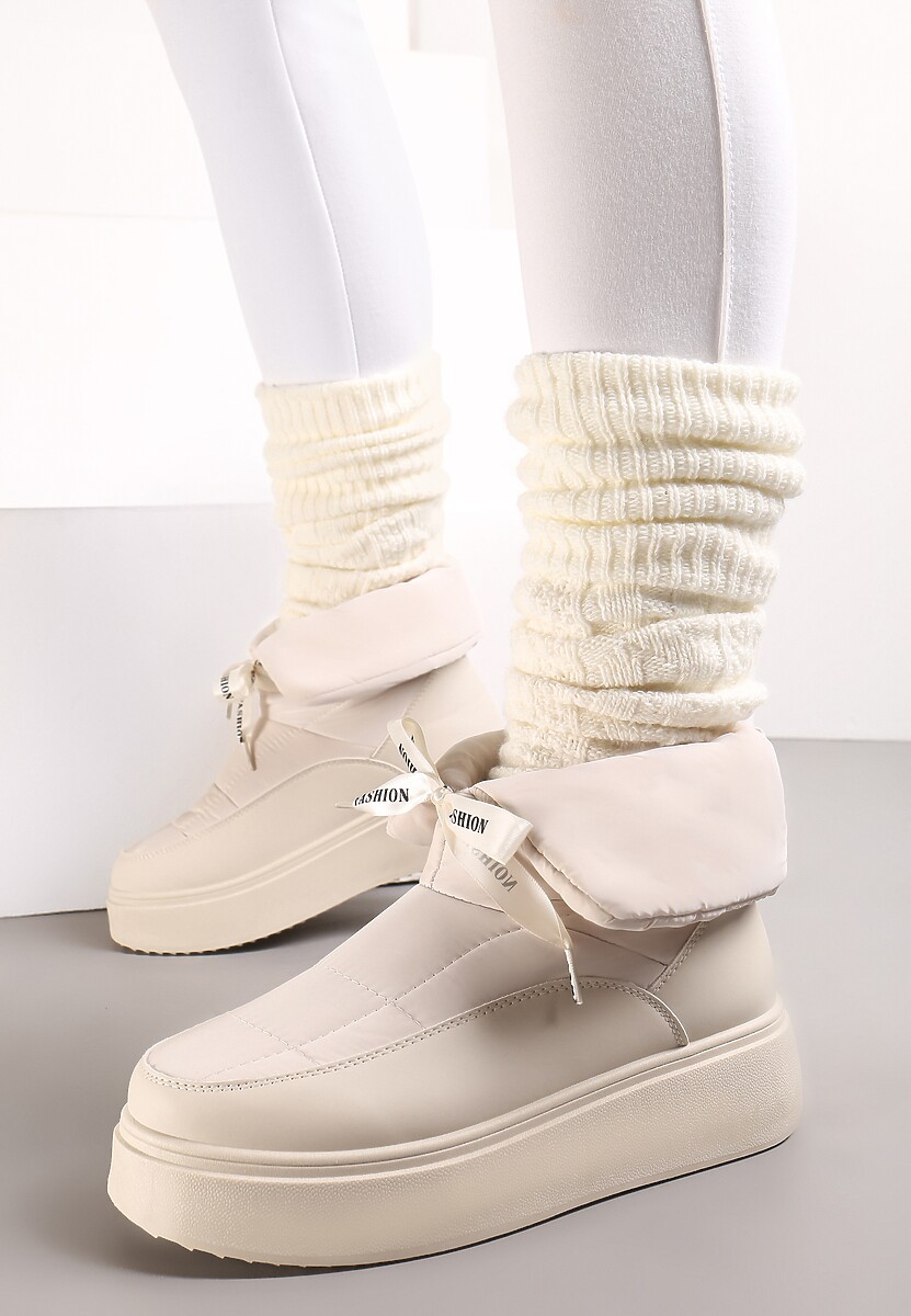 Beżowe Śniegowce z Ozdobną Wstążką Wokół Kostki Rohessi