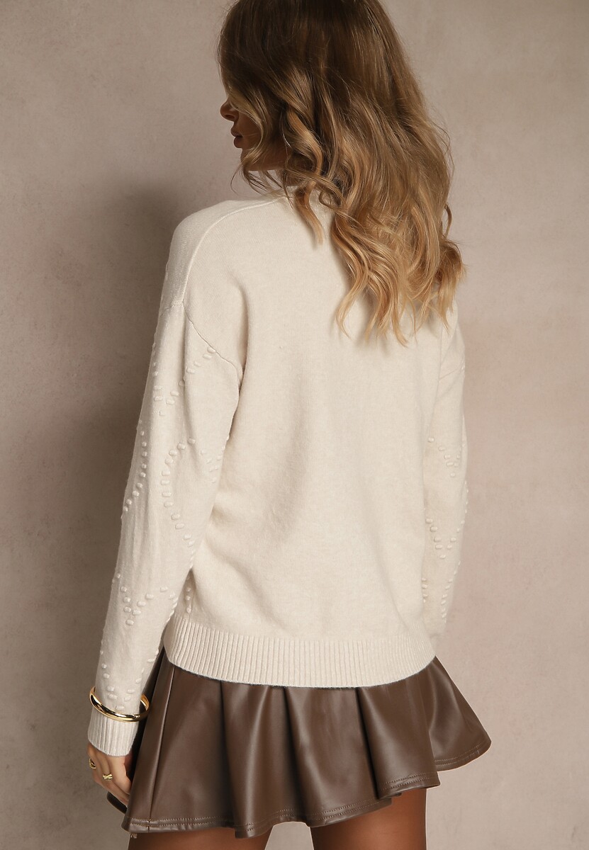 Jasnobeżowy Sweter z Tłoczonymi Sercami Unareia