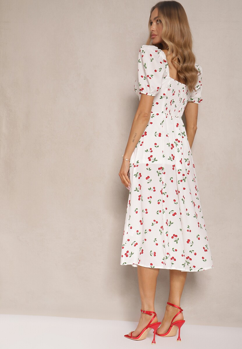 Biała Sukienka o Rozkloszowanym Kroju Ozdobiona Wisienkami i Wiązaniem Hallonia