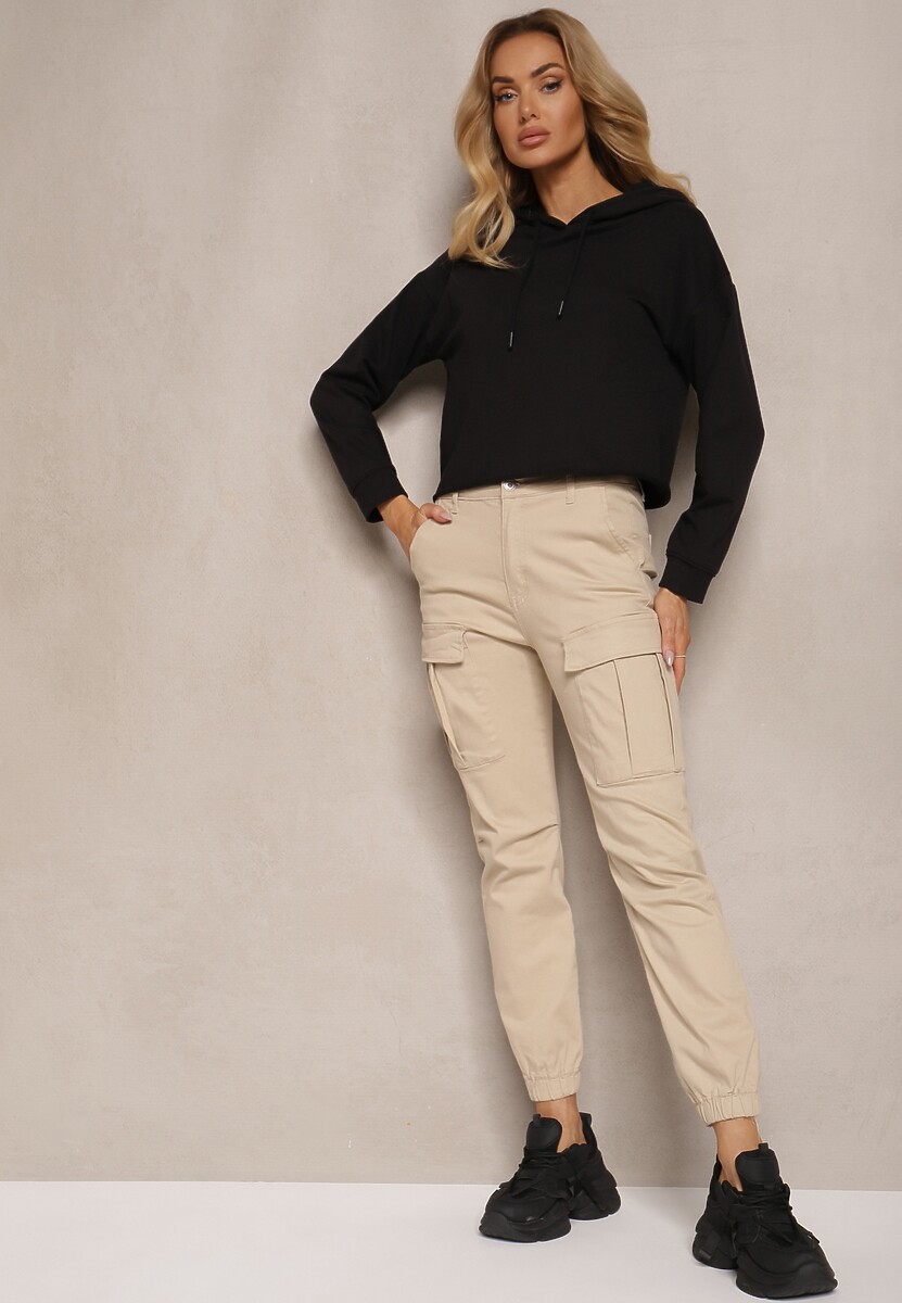 Beżowe Jeansy z Bawełny o Kroju Joggerów z Ozdobnymi Kieszeniami i Gumką w Pasie Unicella