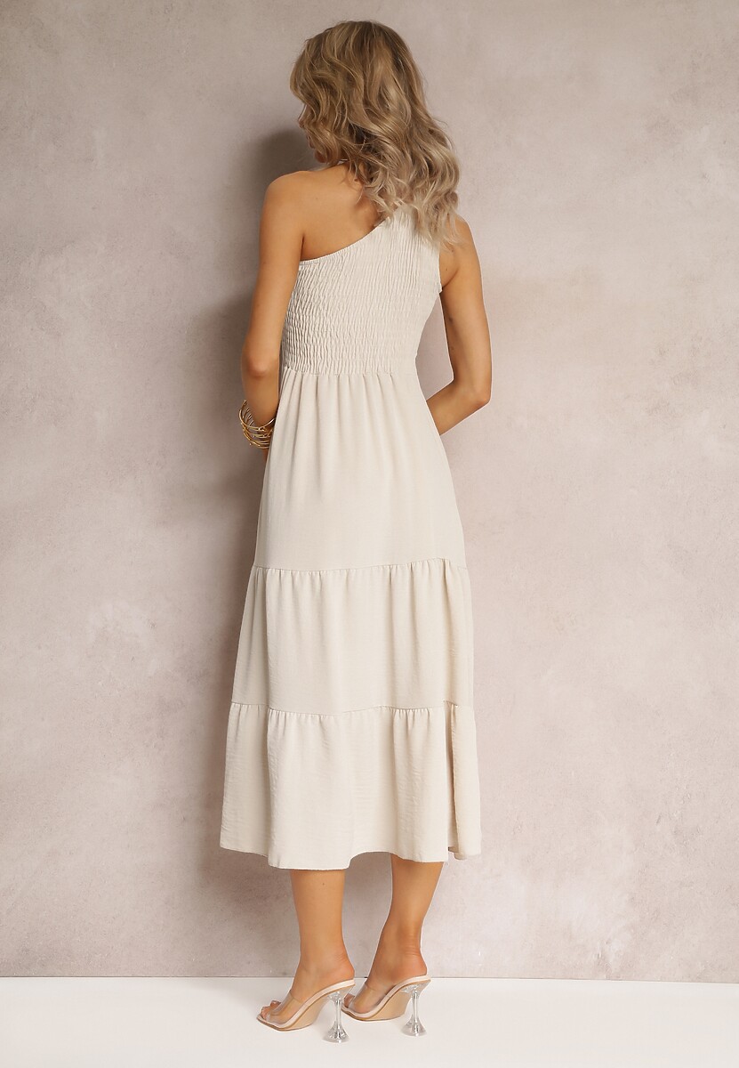 Jasnobeżowa Sukienka Maxi na Jedno Ramię o Rozkloszowanym Asymetrycznym Kroju z Falbanką Kalphus