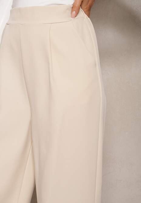 Jasnobeżowe Szerokie Spodnie w Eleganckim Stylu Hanessame