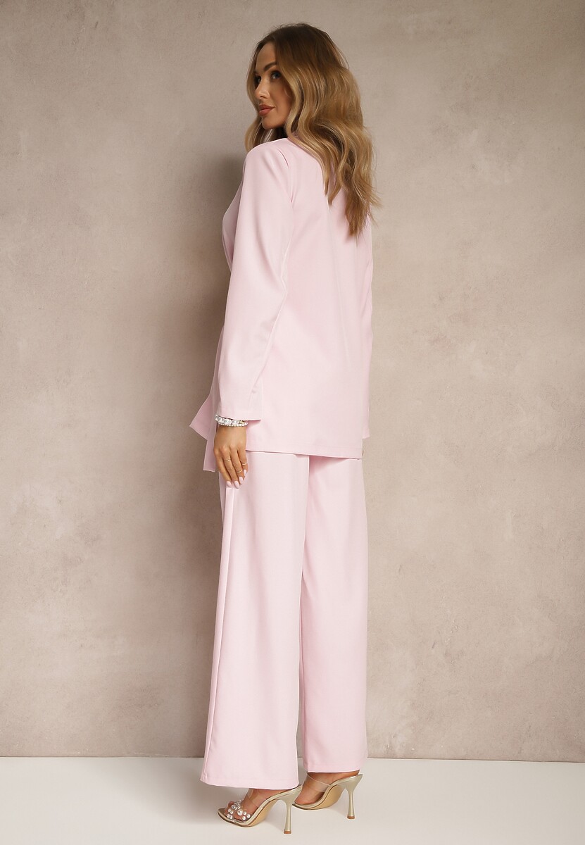 Różowy Garnitur Szerokie Spodnie i Asymetryczna Marynarka Pumeira