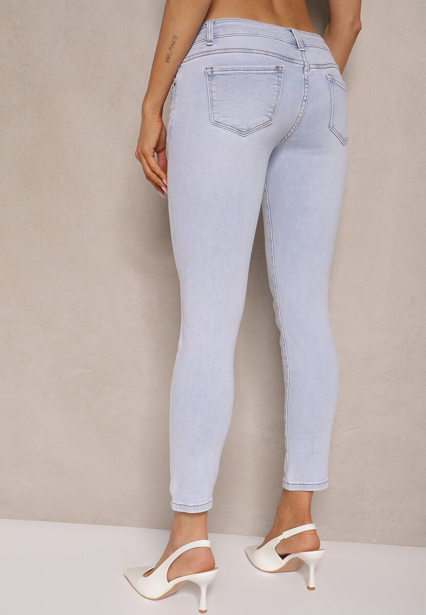 Jasnoniebieskie Jeansy o Kroju Skinny Low Waist Kolanilia