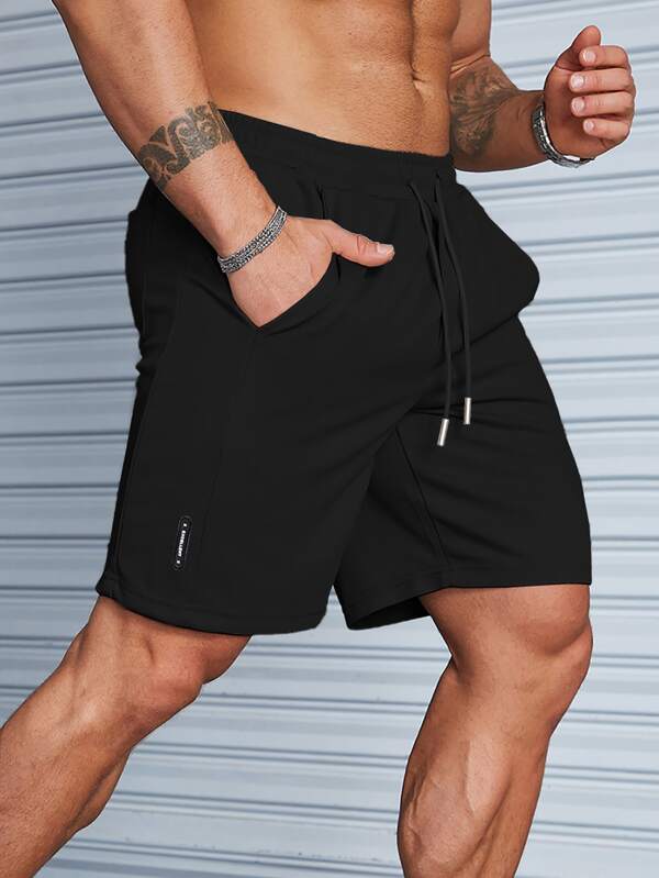 Men Letter Patched Drawstring Waist Shorts