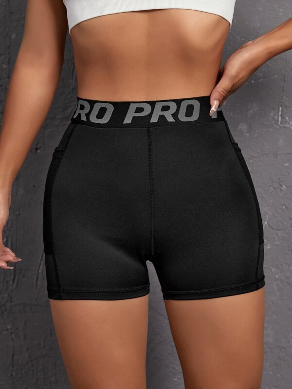 Yoga High Street Letter Tape Waist Sports Shorts With Phone Pocket