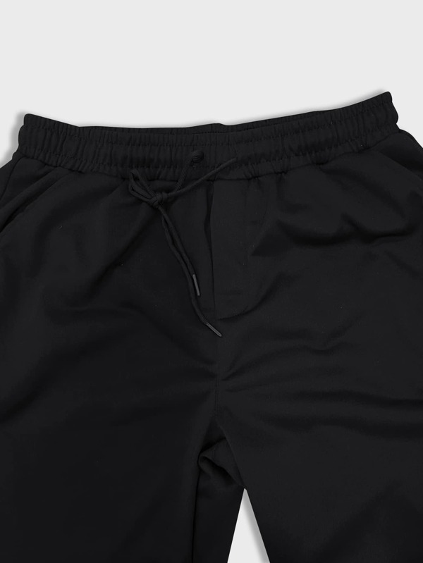 Men Rocket & Spaceman Print Drawstring Sweatpants