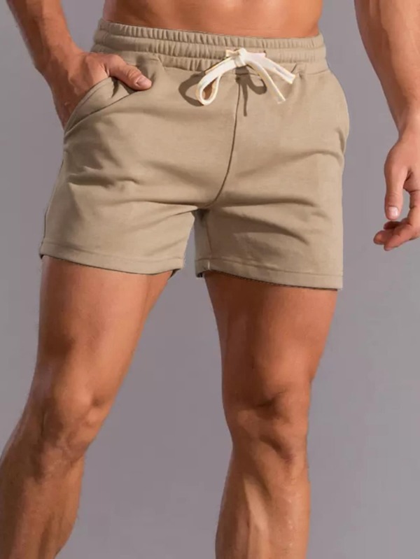 Men Solid Drawstring Waist Slant Pocket Shorts