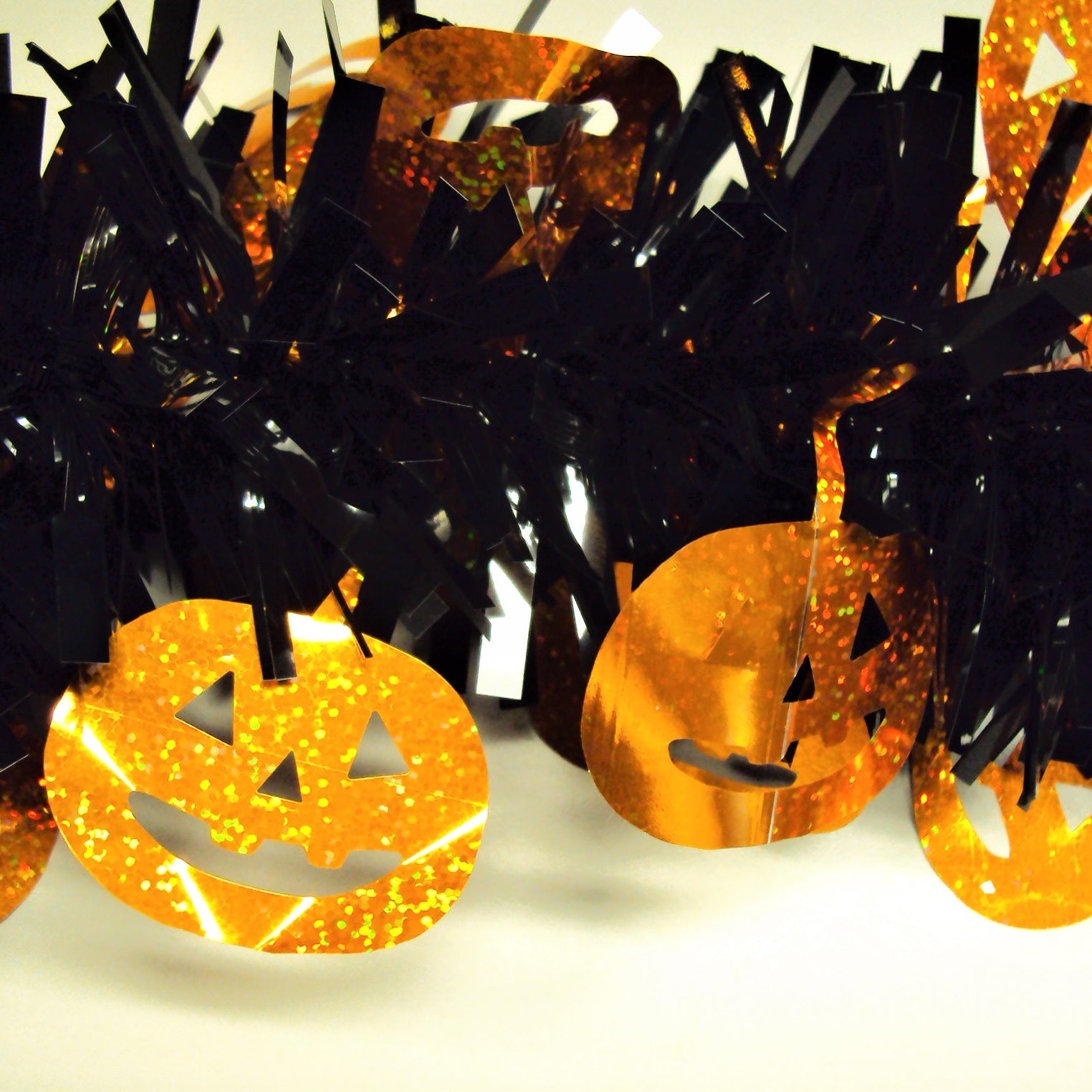 9' Black Tinsel Garland with Holographic Pumpkins