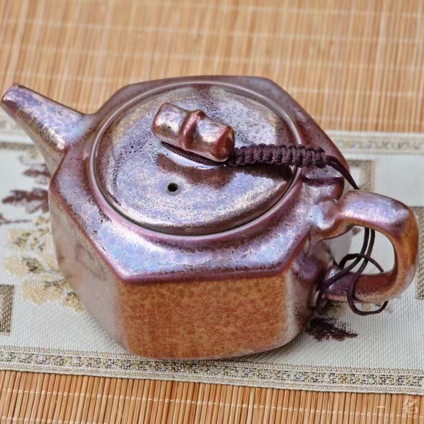 Hexagonal water cutoff teapot