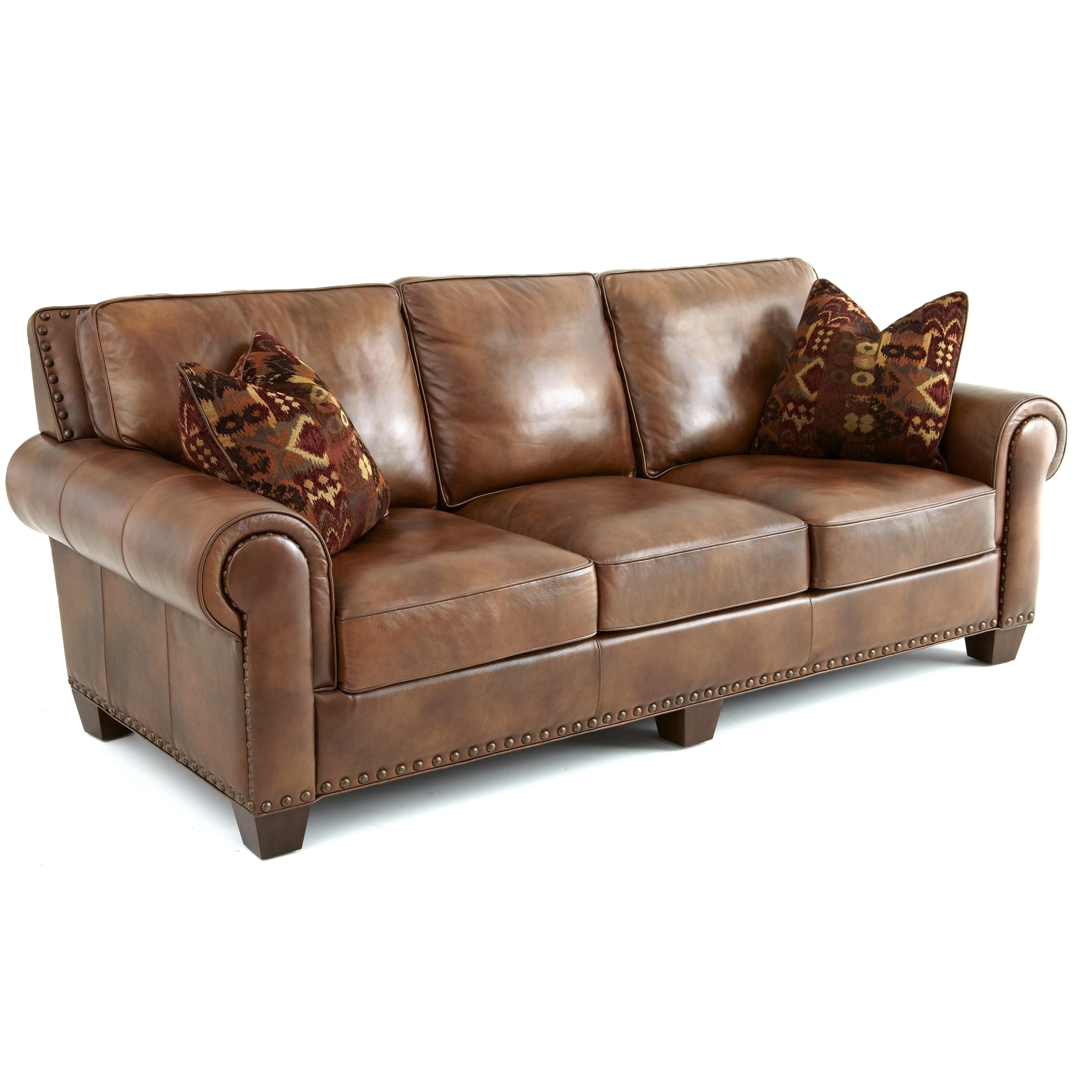 Steve Silver Sanremo Top Grain Leather Sofa with Nail Head Trim and Decorative Pillows