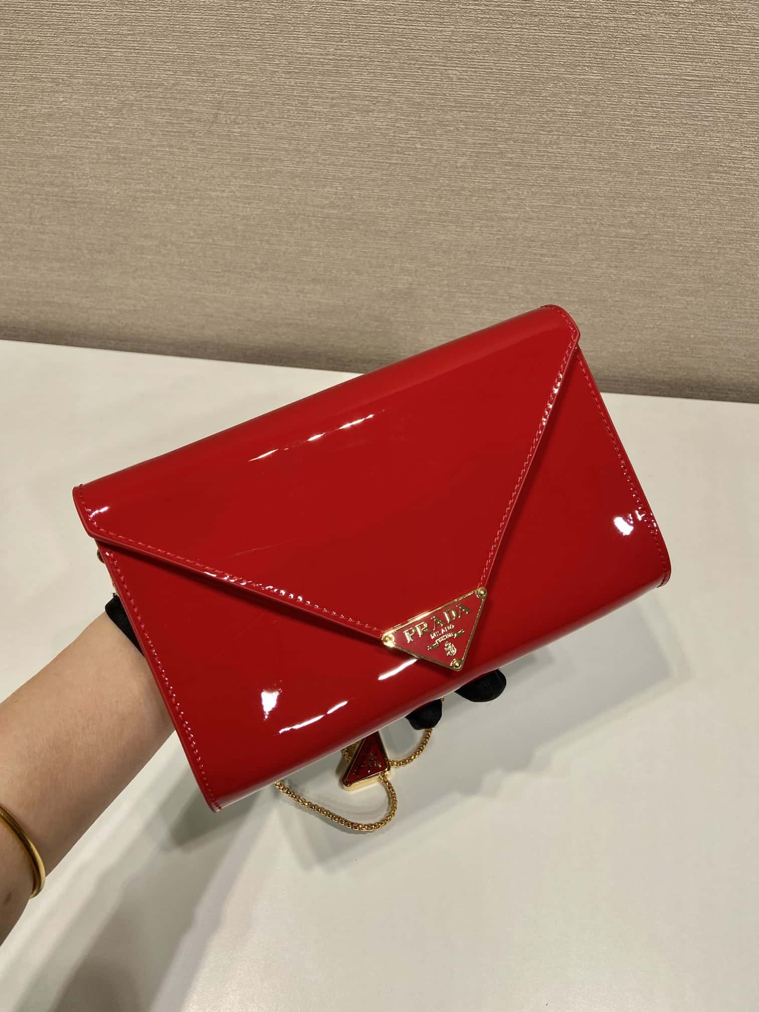 PRADA   patent leather envelope