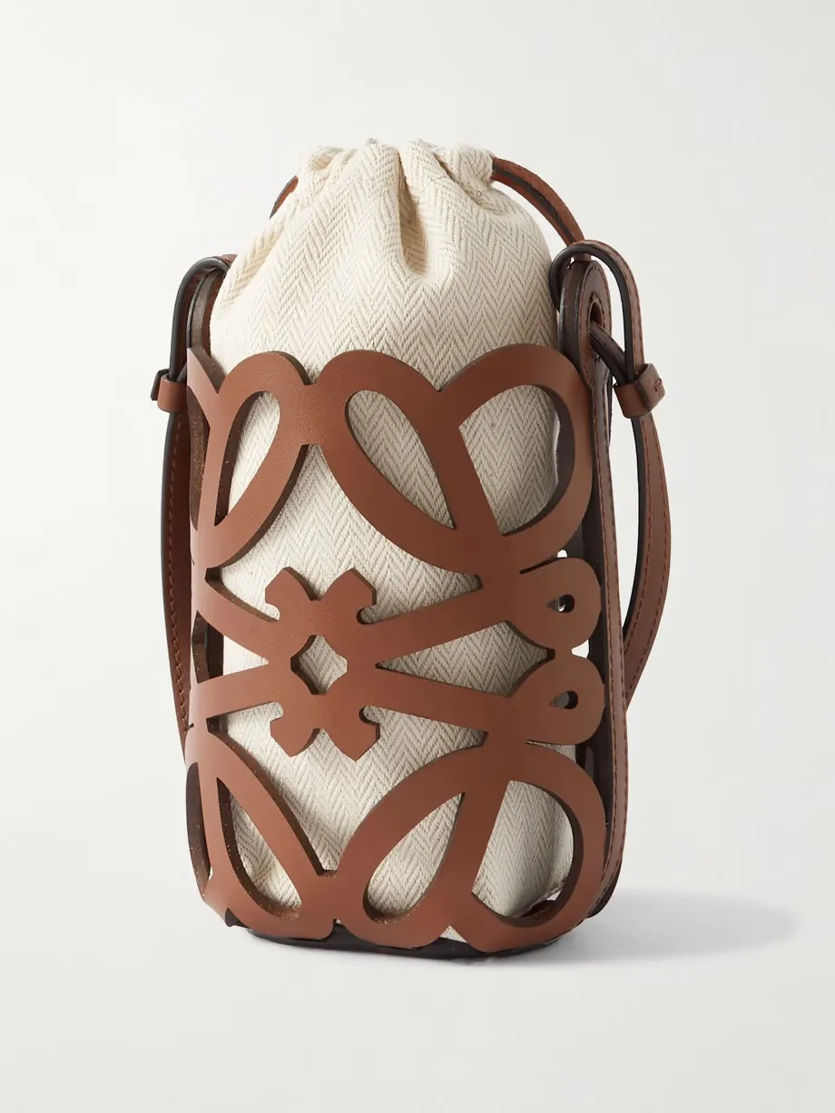 + Paula's Ibiza cutout leather and herringbone canvas shoulder bag