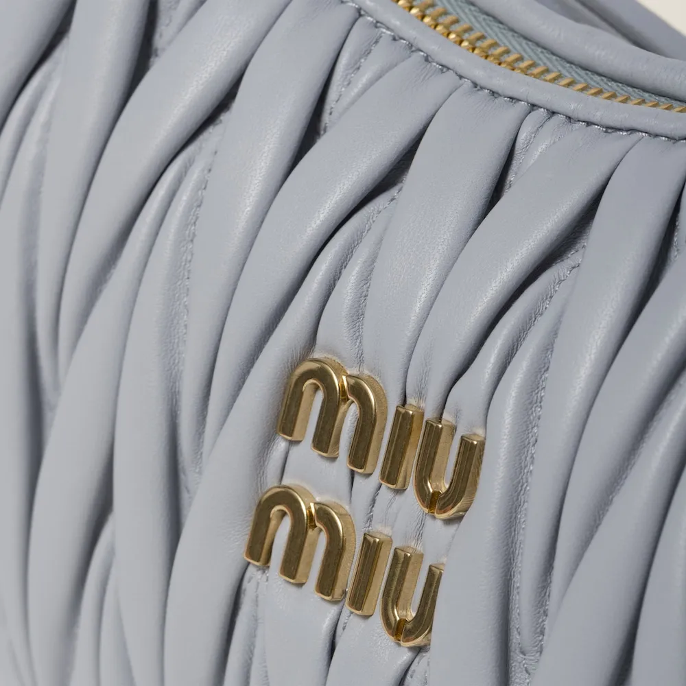 Wander matelassé nappa leather mini hobo bag