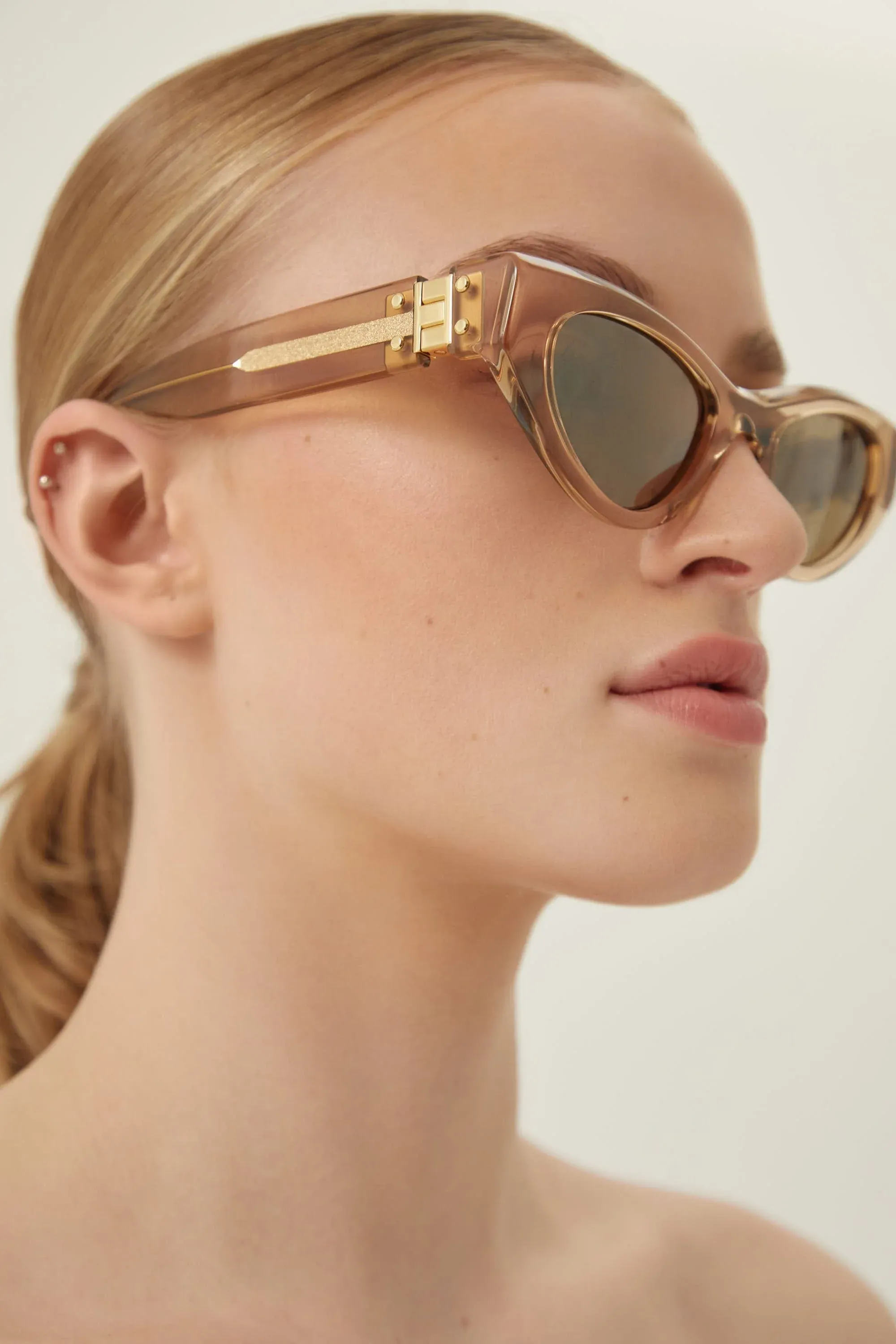 Bottega Veneta gold cat eye sunglasses