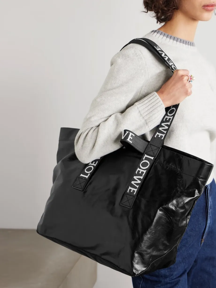 Fold large webbing-trimmed leather tote