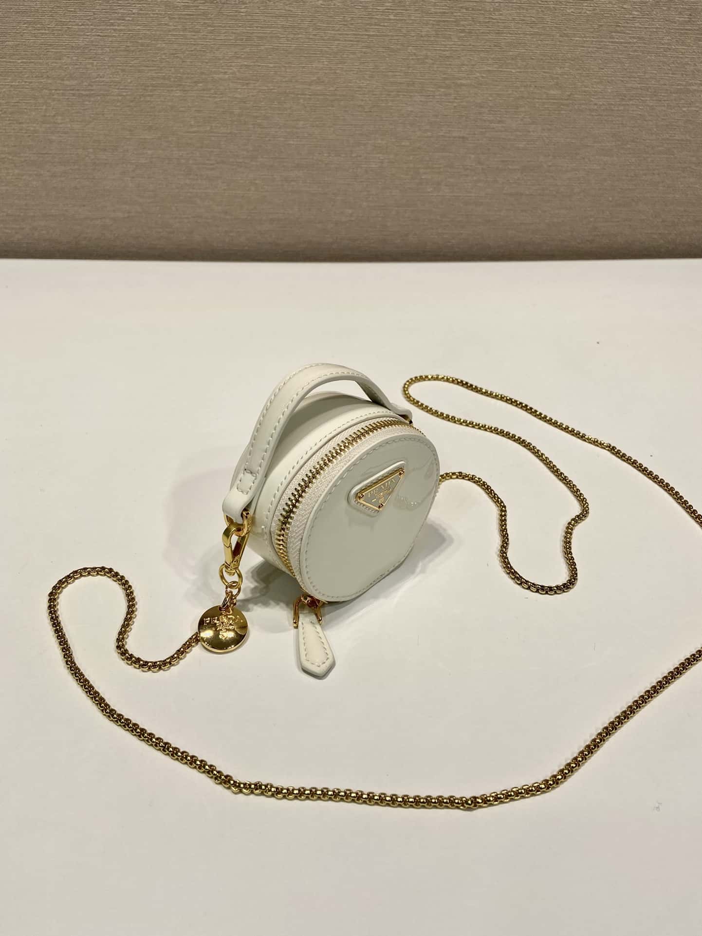 PRADA patent leather small round bag