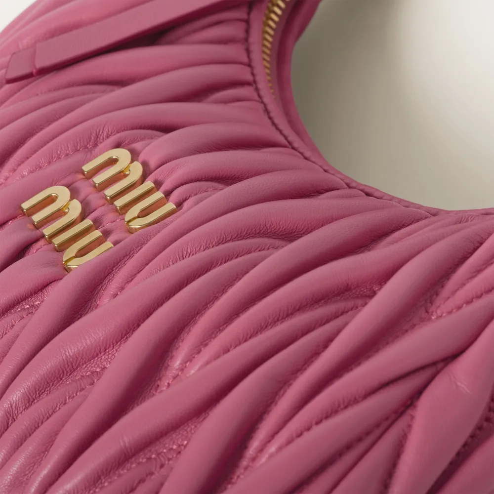 Wander matelassé nappa leather mini hobo bag