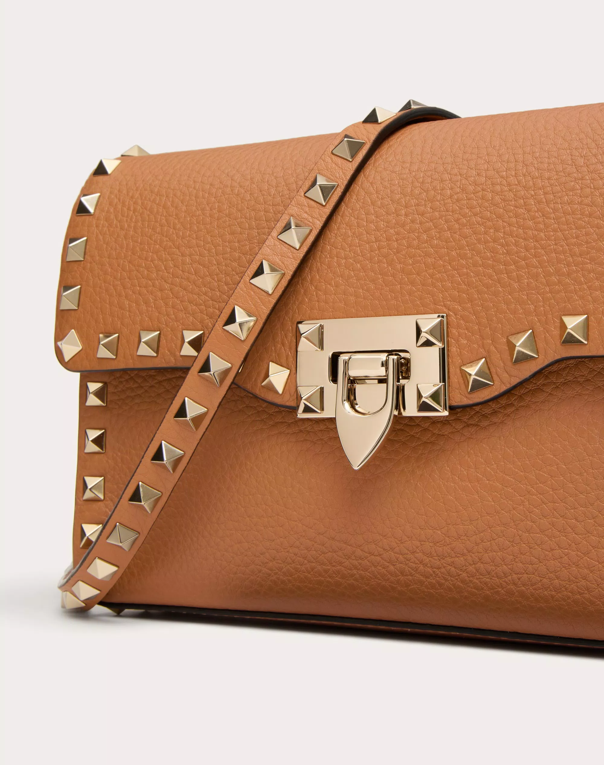 SMALL ROCKSTUD GRAINY CALFSKIN CROSSBODY BAG