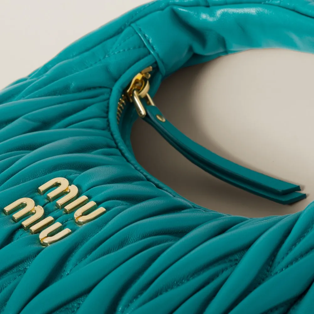 Wander matelassé nappa leather mini hobo bag