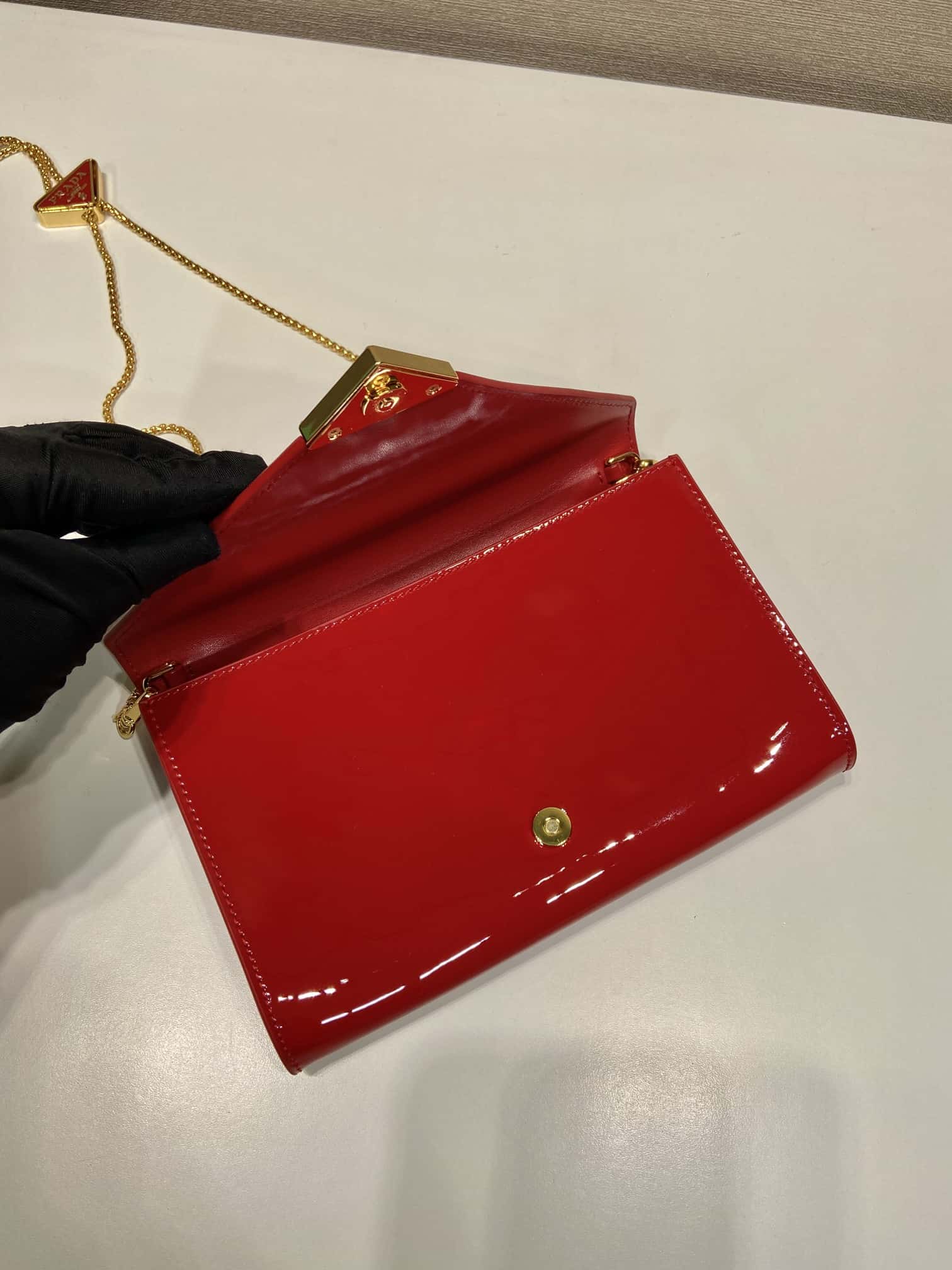PRADA   patent leather envelope