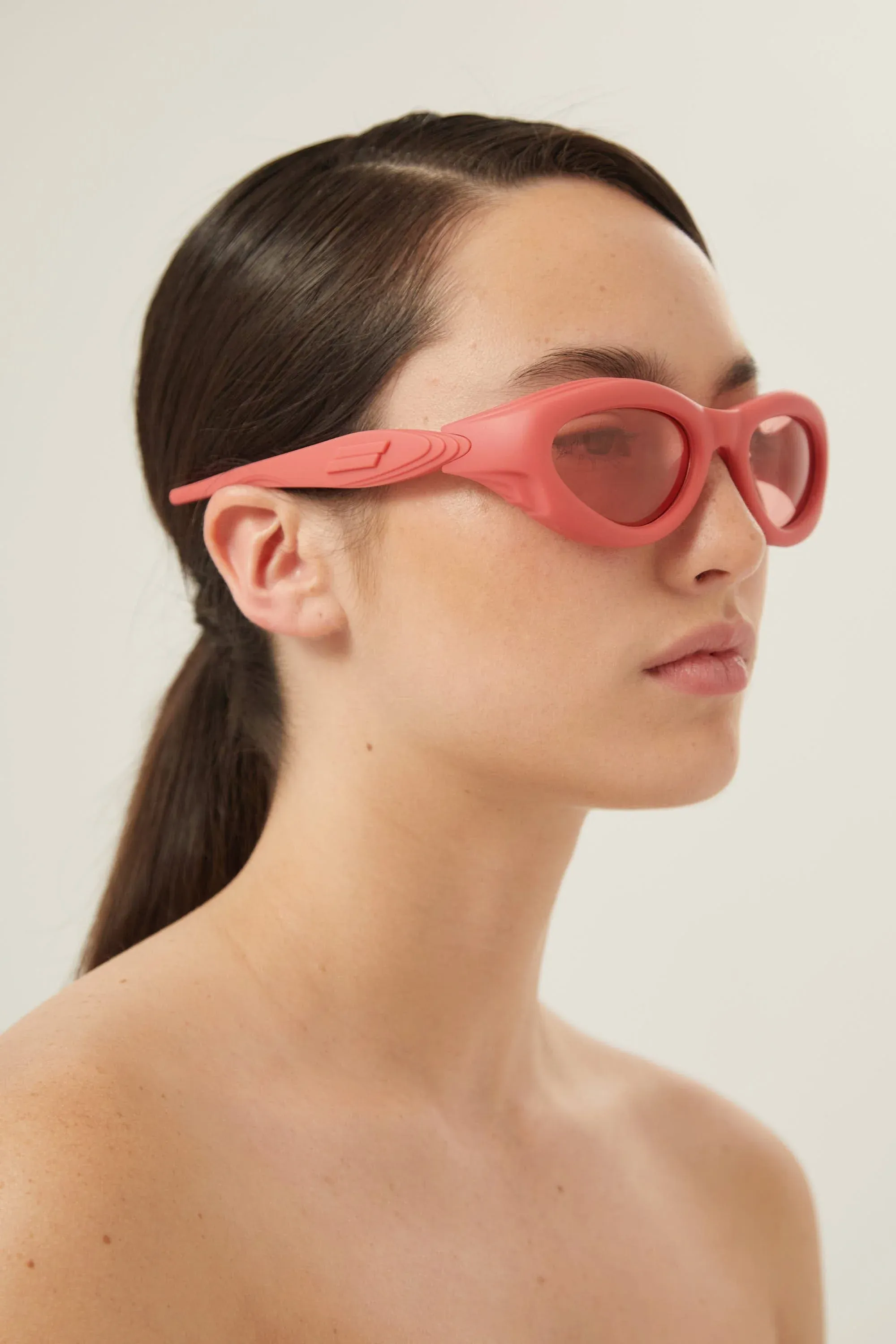 Bottega Veneta bold pink rubber sunglasses
