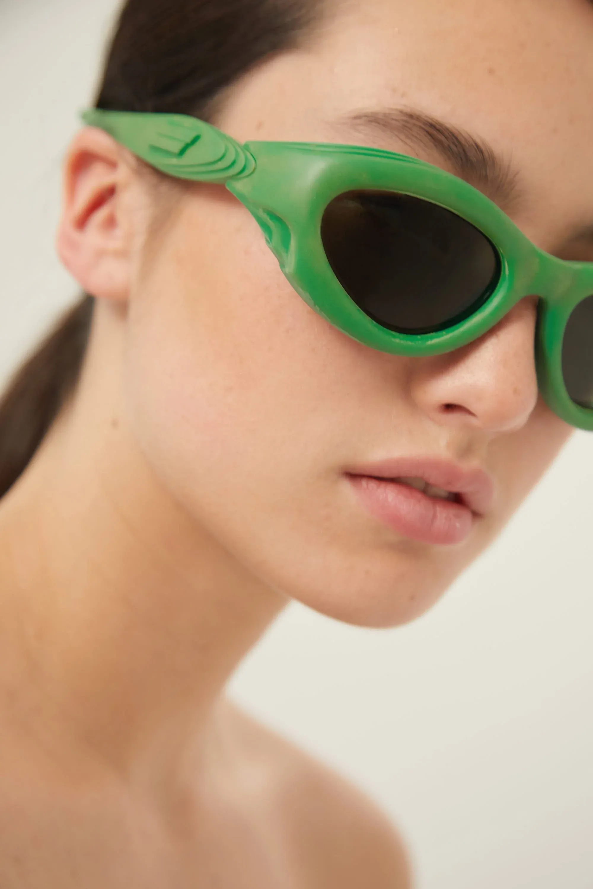 Bottega Veneta bold green rubber sunglasses