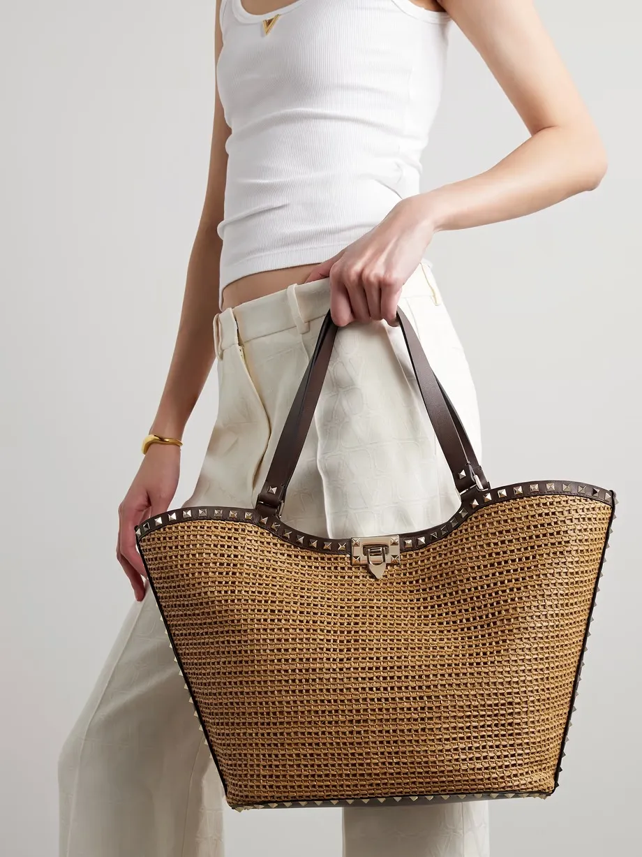 Rockstud leather-trimmed raffia tote