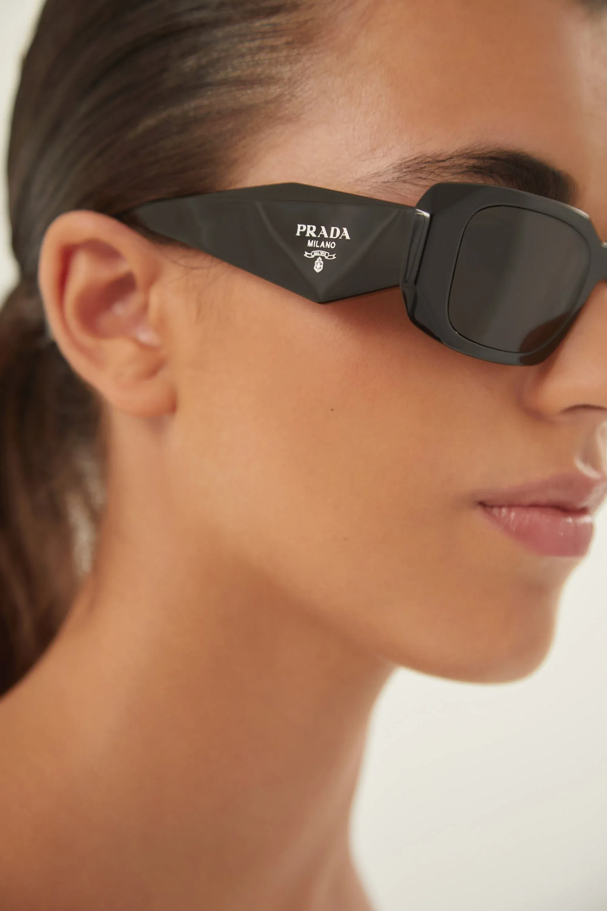 Prada symbol black oval sunglasses