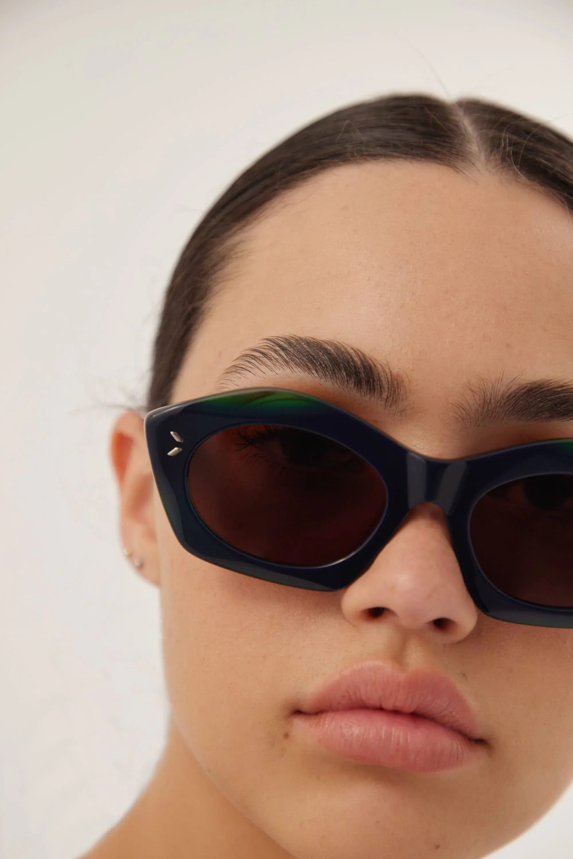 MCQ bold geometric blu and green sunglasses