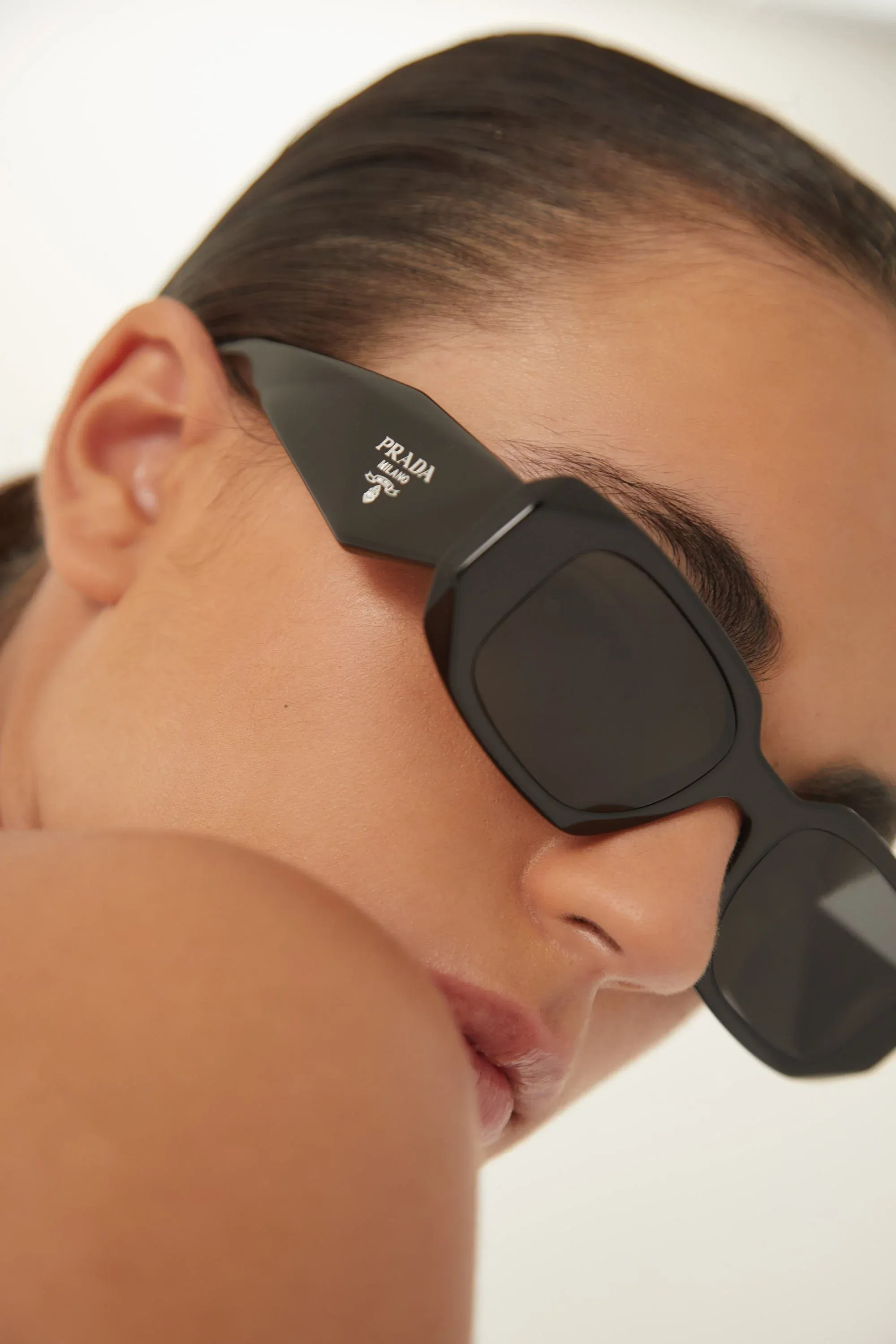 Prada symbol black oval sunglasses