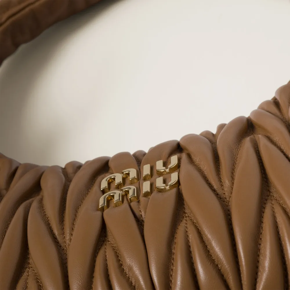 Wander matelassé nappa leather hobo bag 18cm