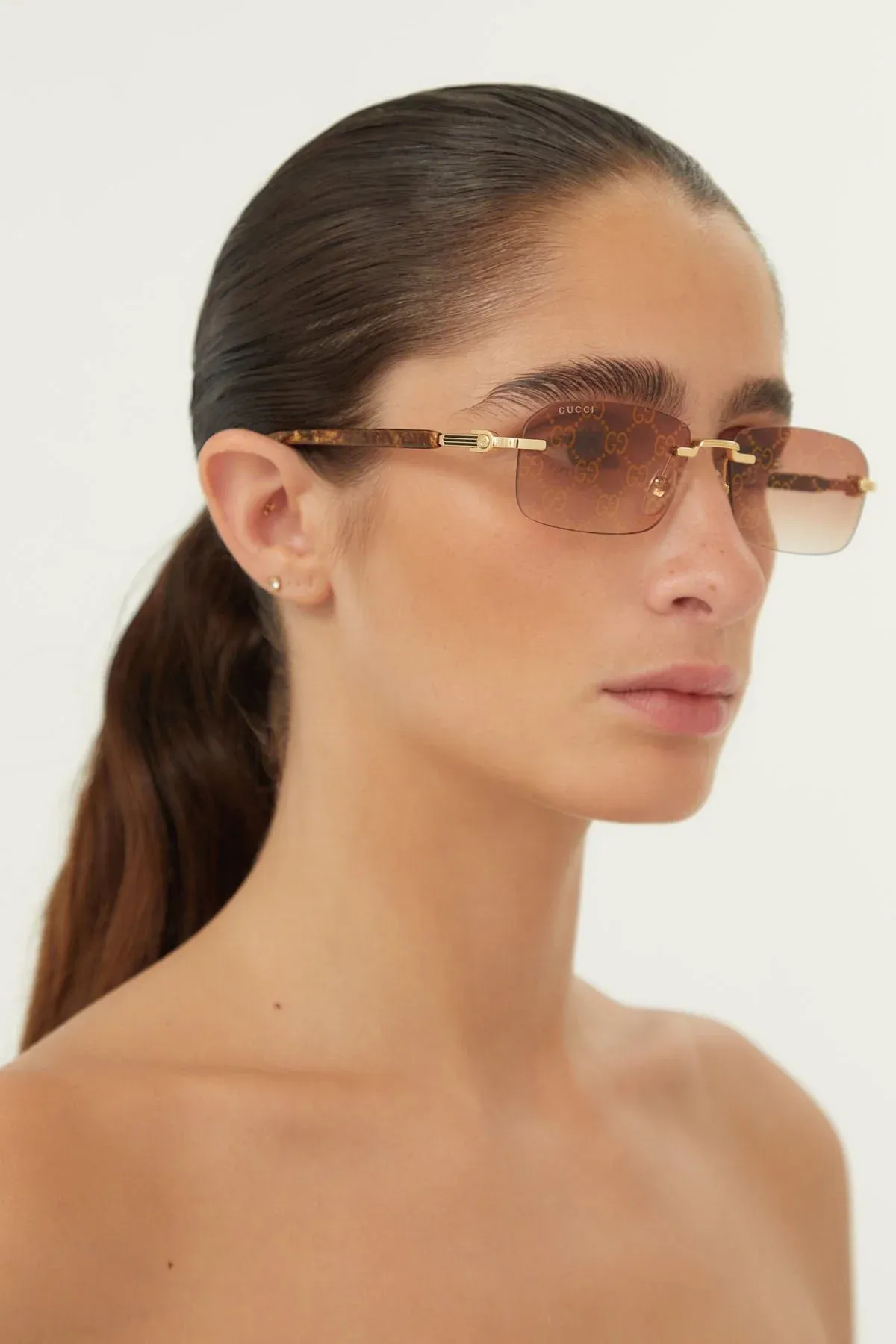 Gucci micro metal sunglasses with logo all over