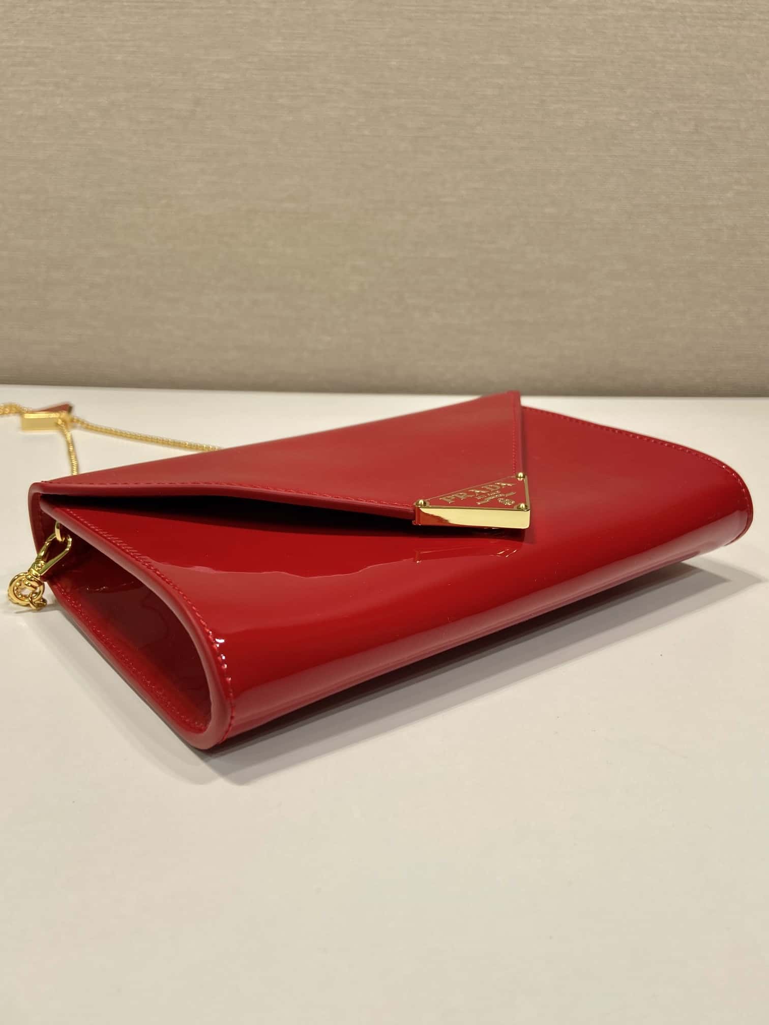 PRADA   patent leather envelope
