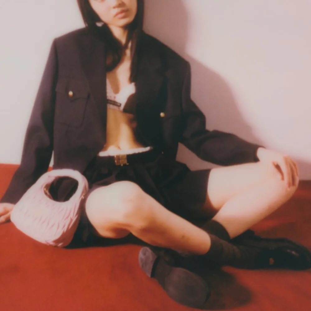 Wander matelassé nappa leather mini hobo bag