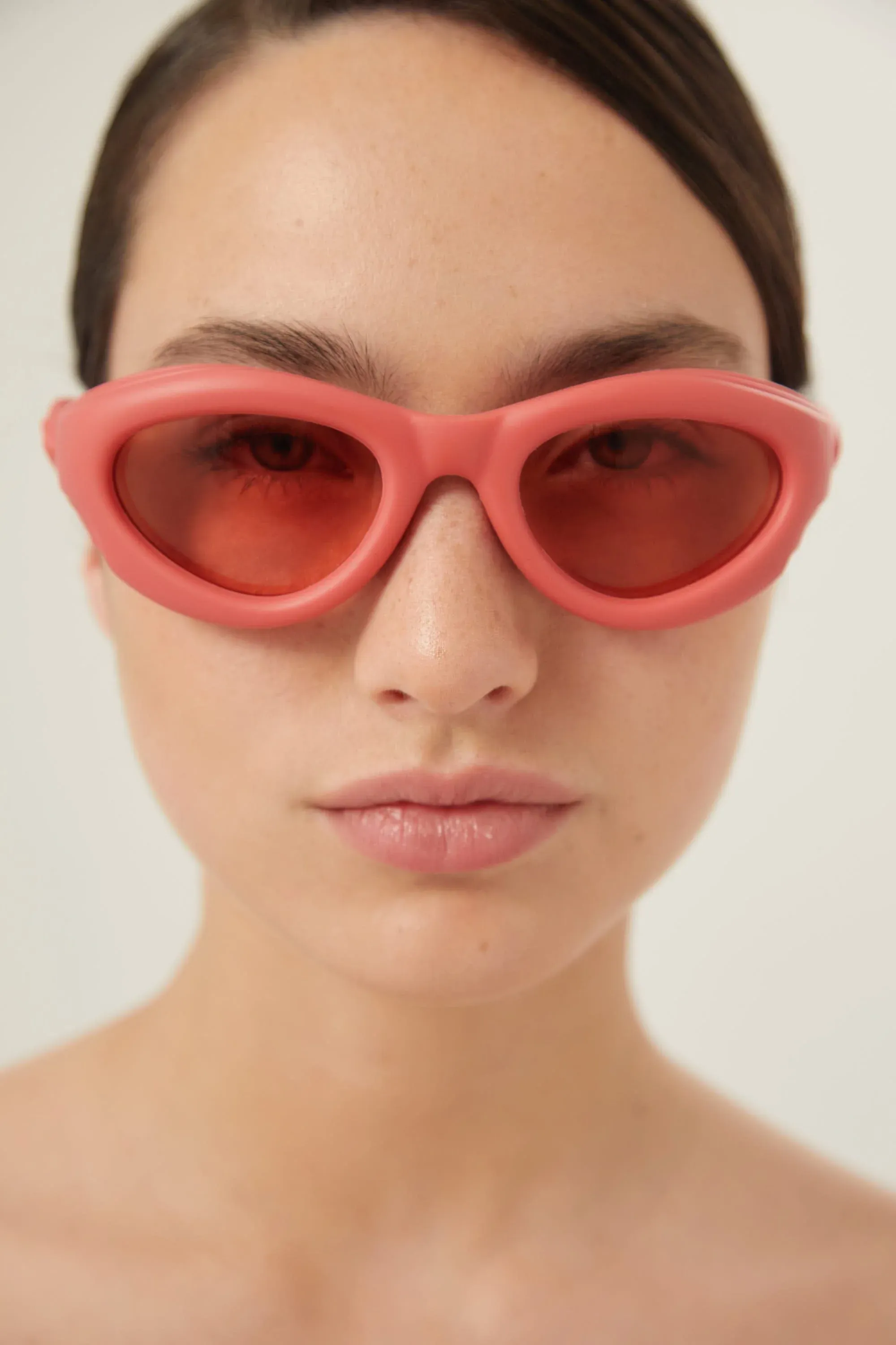 Bottega Veneta bold pink rubber sunglasses