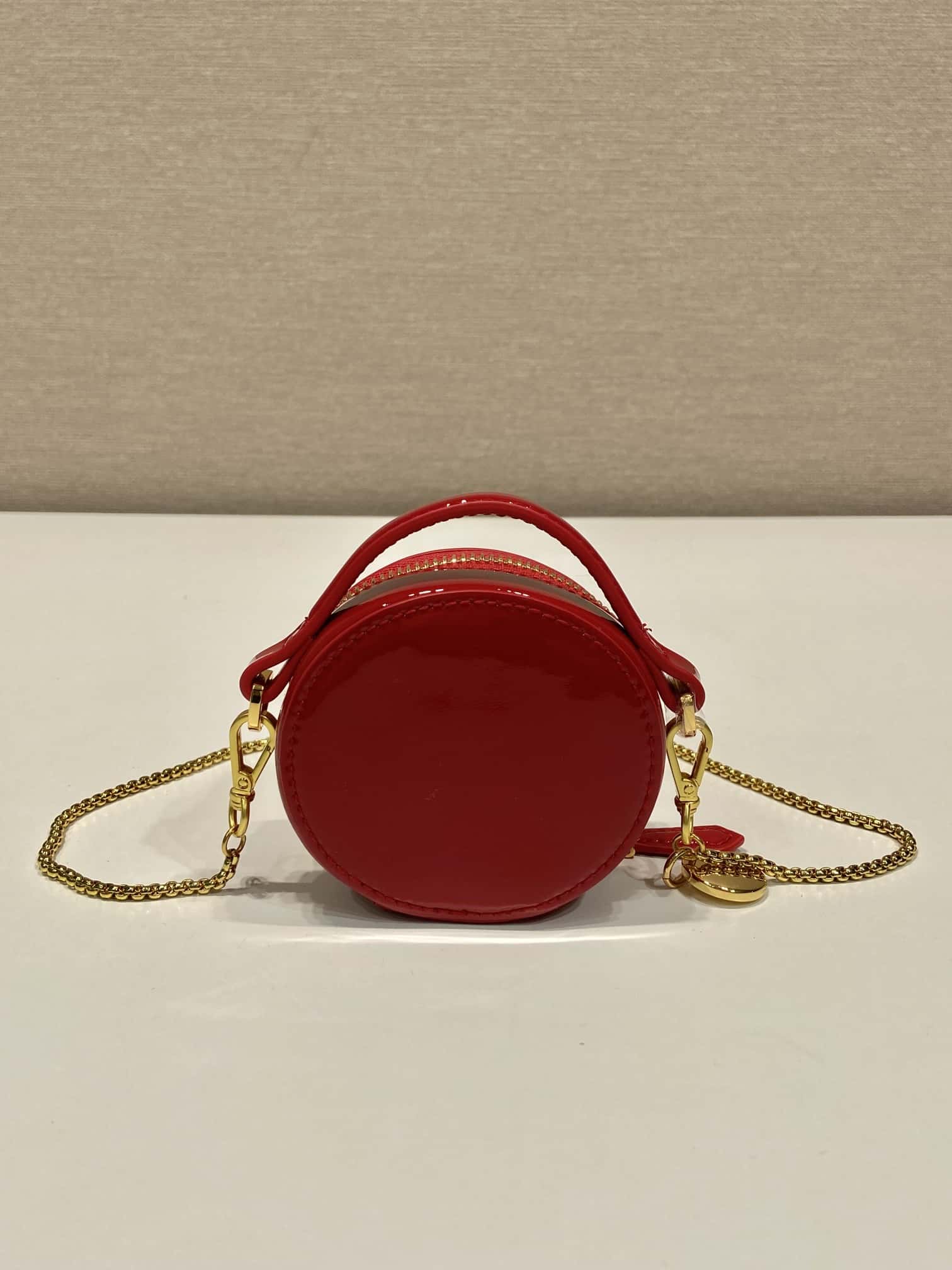 PRADA  patent leather small round bag