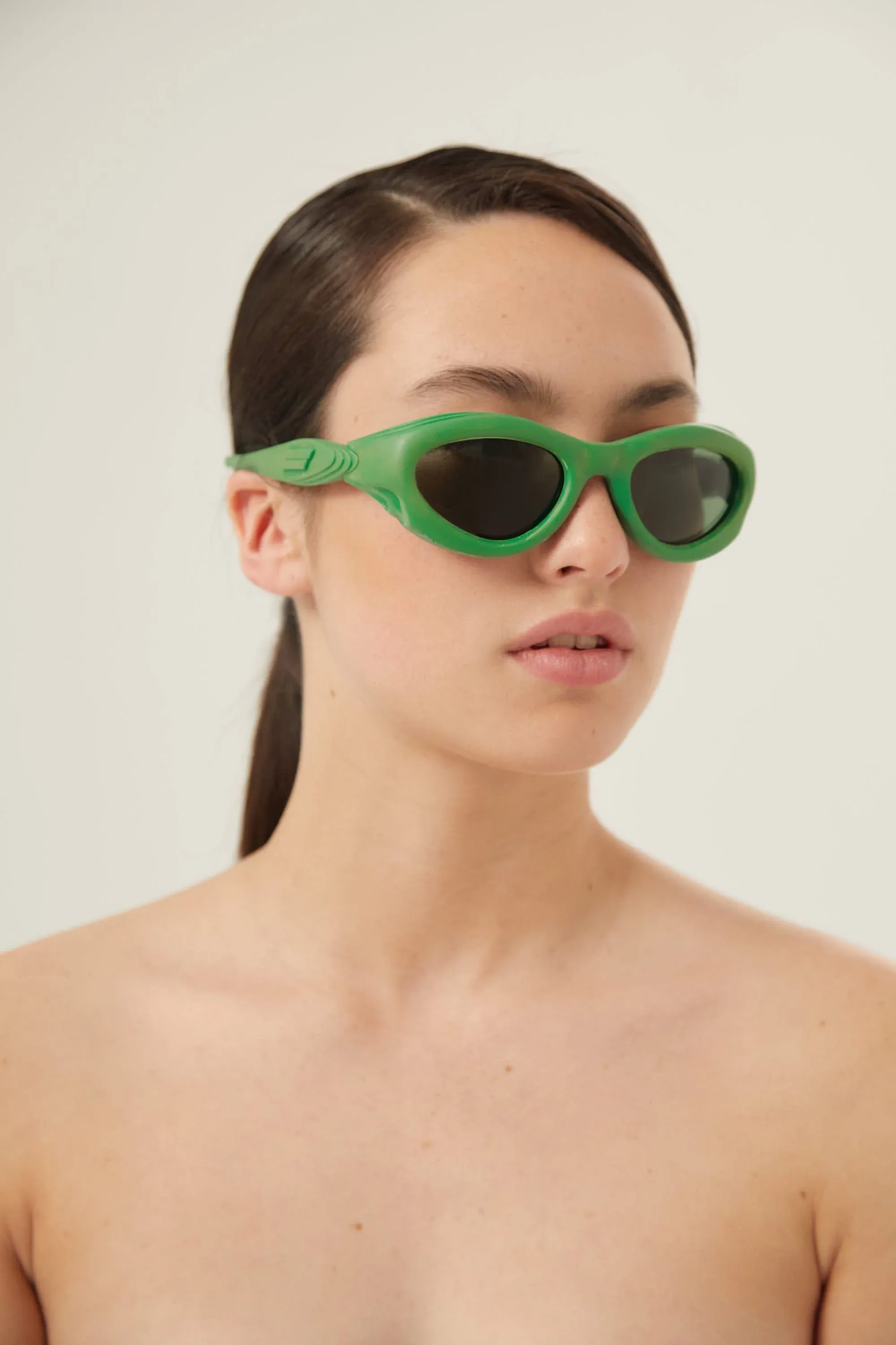 Bottega Veneta bold green rubber sunglasses