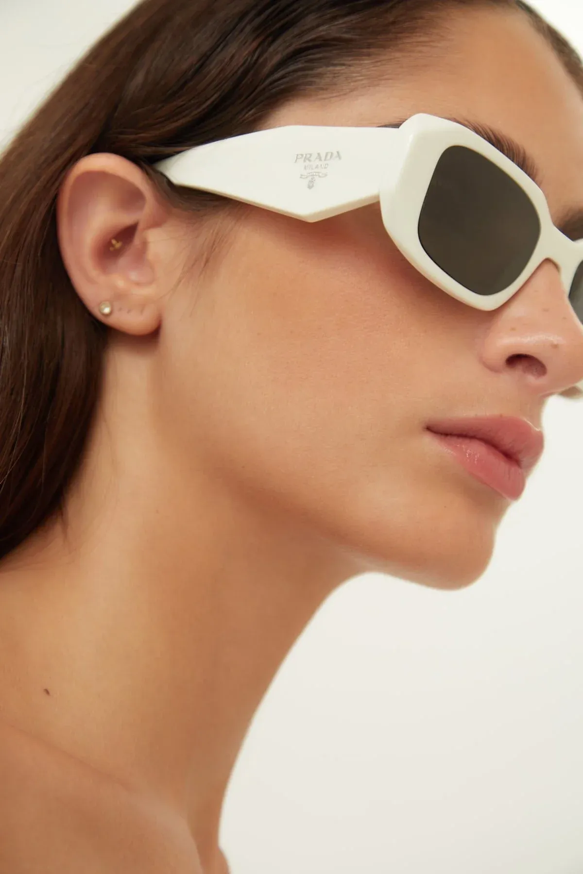 Prada symbol white oval sunglasses