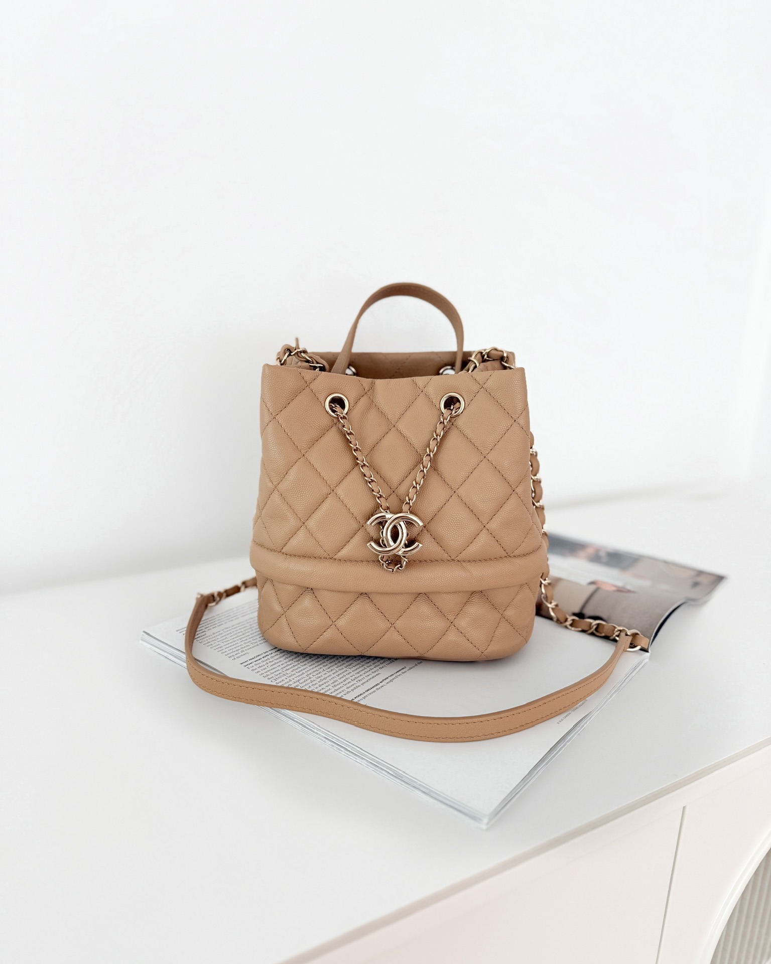 Chanel Rolled Up Bucket Drawstring Bag Beige Caviar