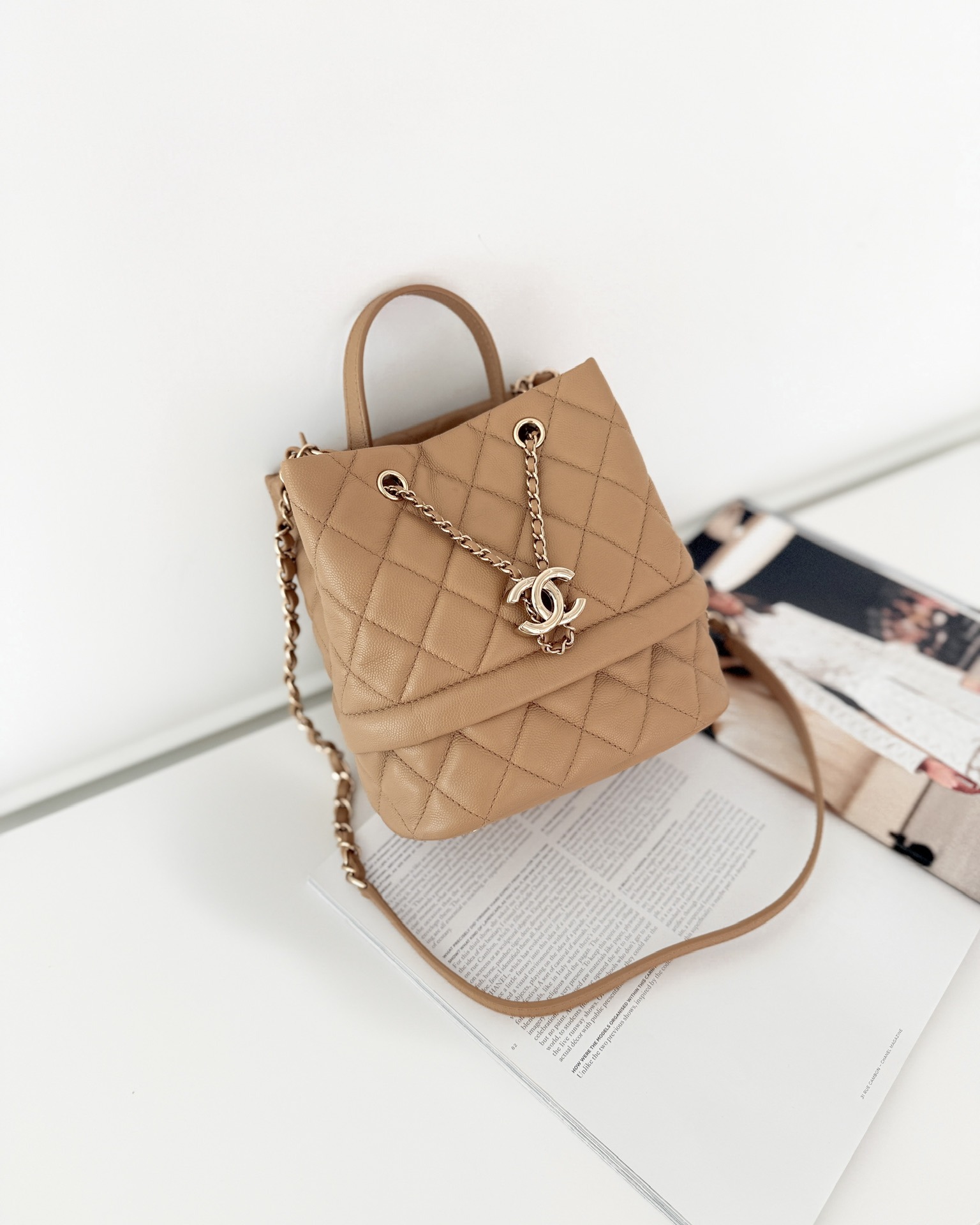 Chanel Rolled Up Bucket Drawstring Bag Beige Caviar