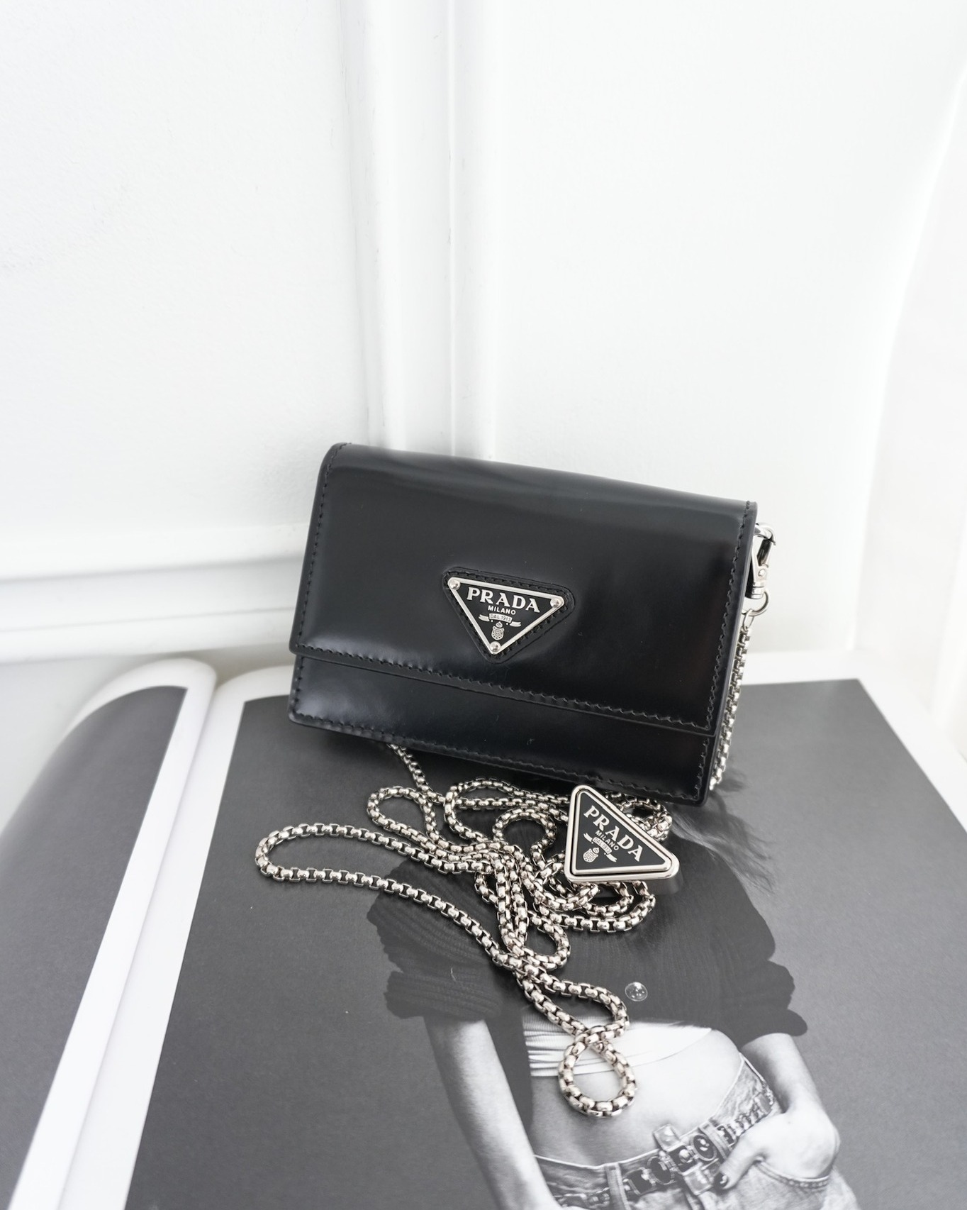 Prada Card Holder with Shoulder Strap ini Black Brushed Leather